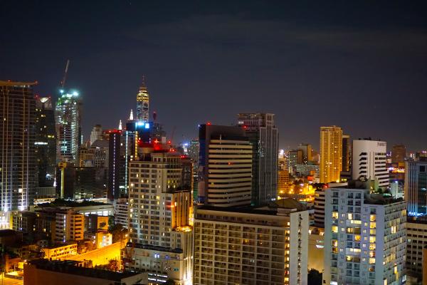 Concrete High Rise Building during Night Time