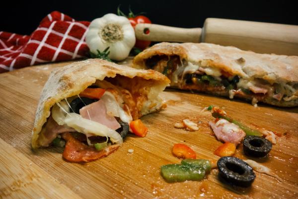Cooked Food Served on Brown Wooden Board