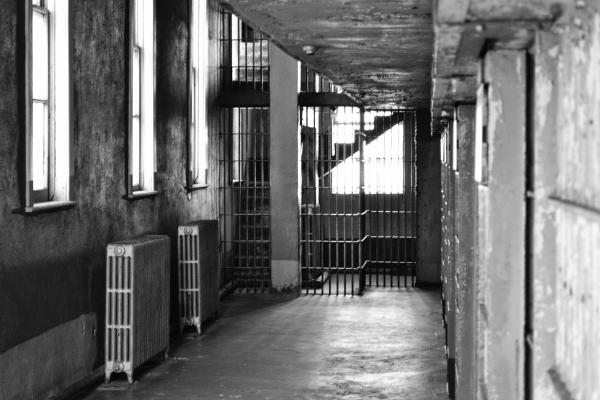 Corridor with heaters and bars in the old prison
