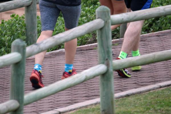 couple jogging on the seaside
