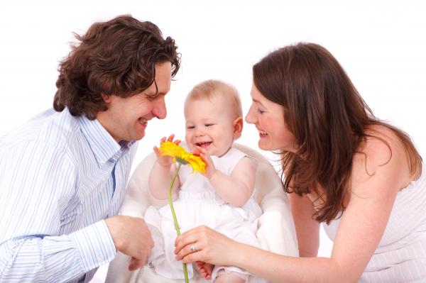 Couple Playing With Their Baby