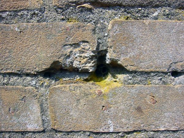Cracked brick wall