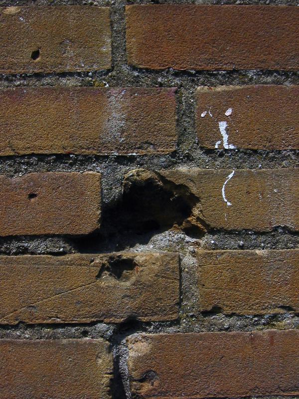Cracked brick wall