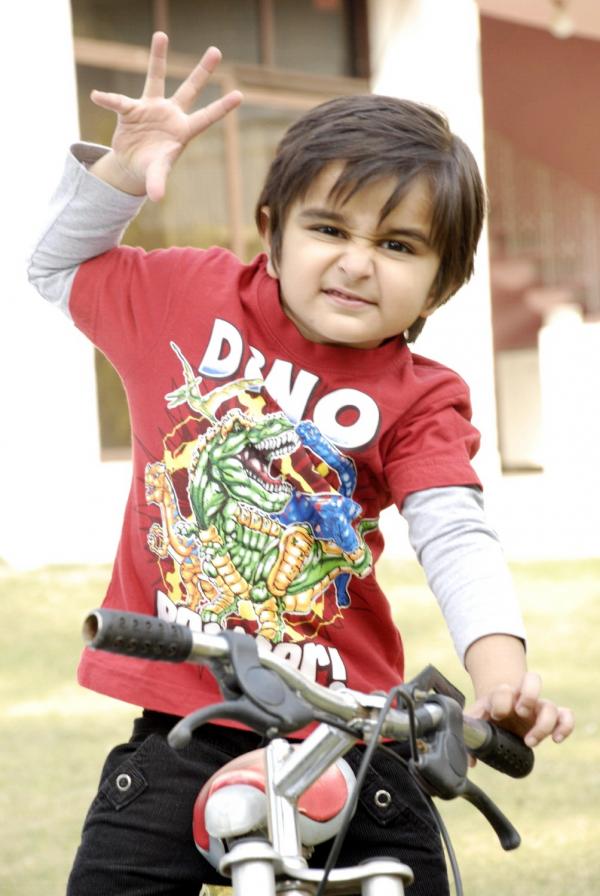 Cute Baby Boy with Bicycle