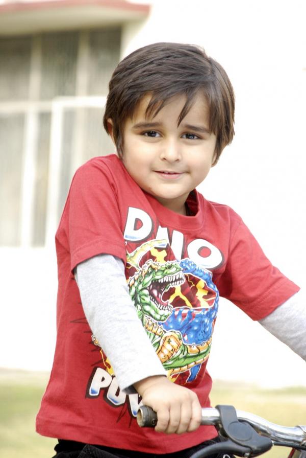 Cute Kid with Bicycle