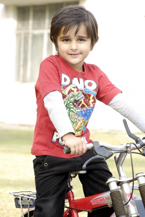 Cute Kid with Bicycle