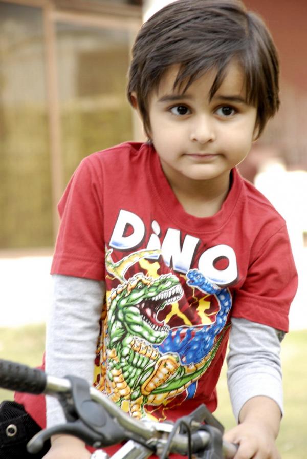 Cute Kid with Bicycle