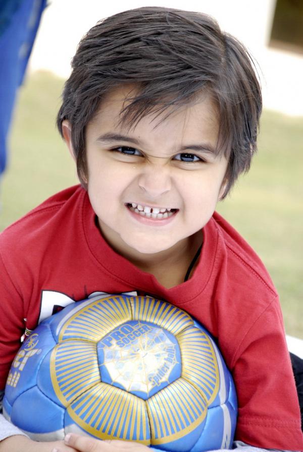 Cute Kid With Football