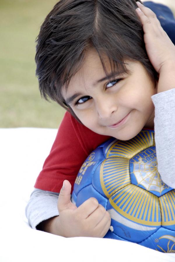 Cute Kid With Football