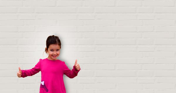 Cute Little Girl Showing Thumbs Up