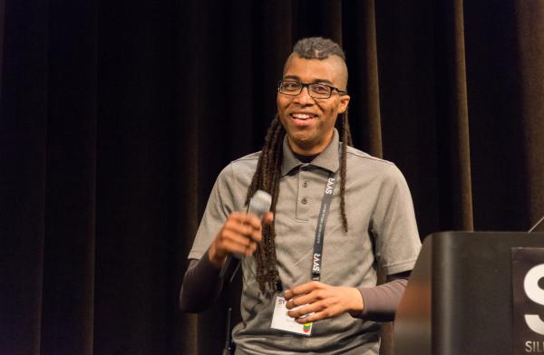 Cymatice Bruce looking at audience and smiling during SVVR opening session
