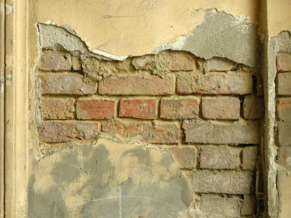 Damaged brick wall