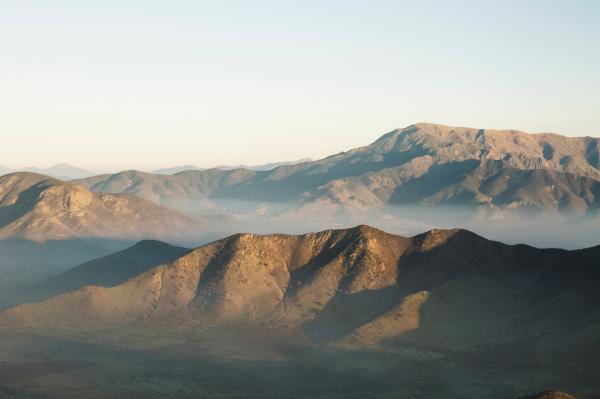 Empty Mountains Under Clear Blue Sky