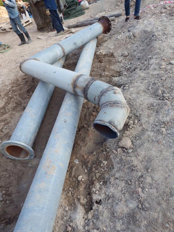 Engineers work on a pipeline
