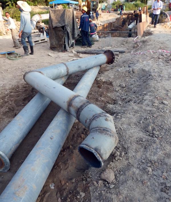 Engineers work on a pipeline
