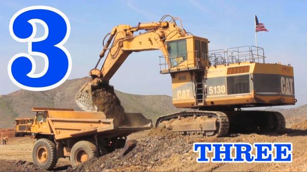 Excavator and truck
