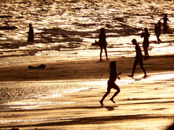 Family Plays on the Beach Silhouette