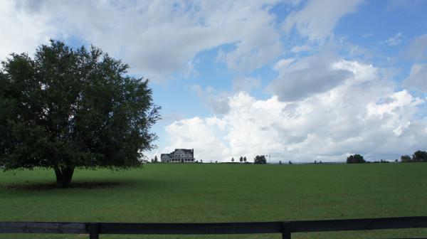 Farmhouse with clouds