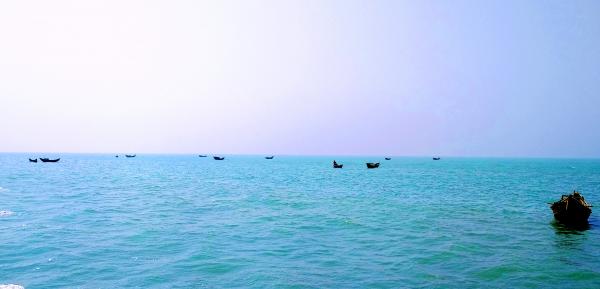 Floating Fishing Boat in Naf River
