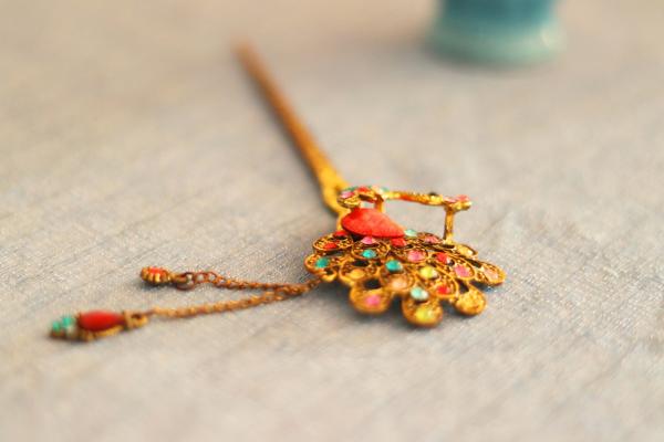 Focus Photography of Yellow and Multi-colored Hair Stick
