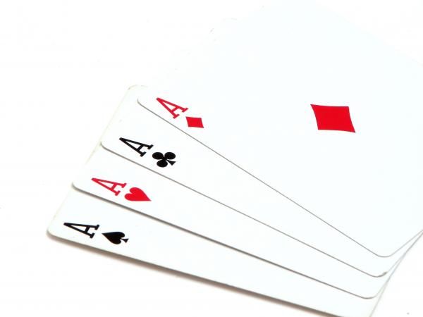 Four aces isolated on a white background