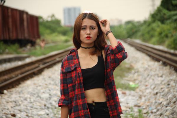 Girl Posing on the Railway Station