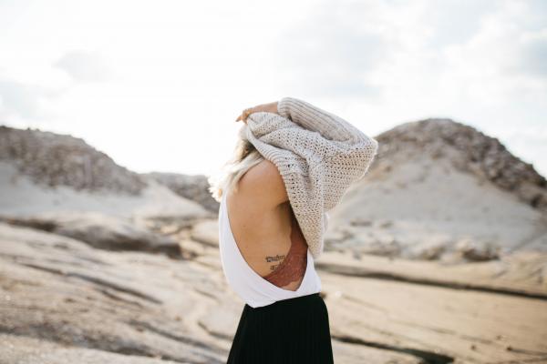 Girl Taking Off Her Sweater