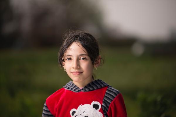 Girl Wearing Red and Black Hoodie