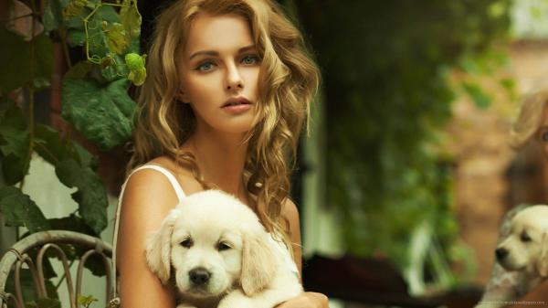 Girl with puppies