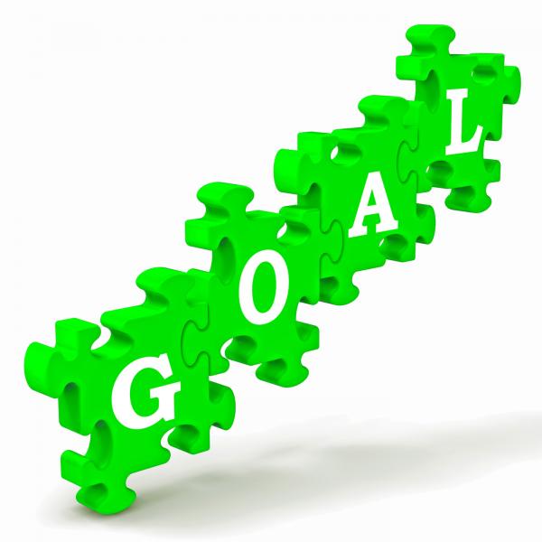 Goal Puzzle Shows Business Targets And Objectives