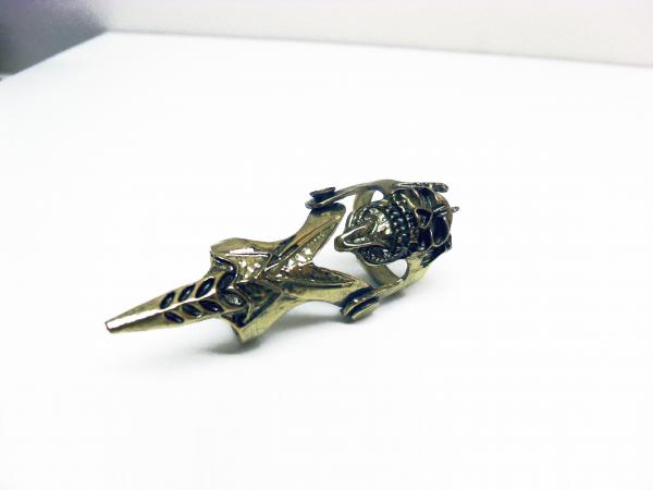 Gold tone gothic finger armor ring