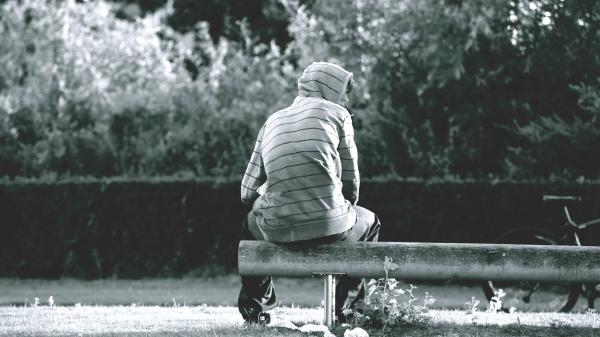 Gray-scale Photo of Person Wearing Stripe Hoodie
