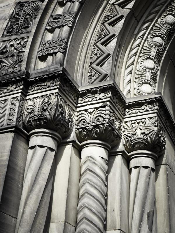 Grayscale Photo of Concrete Building With Pillars