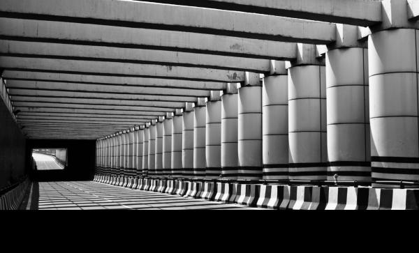 Grayscale Photo of Concrete Pathway