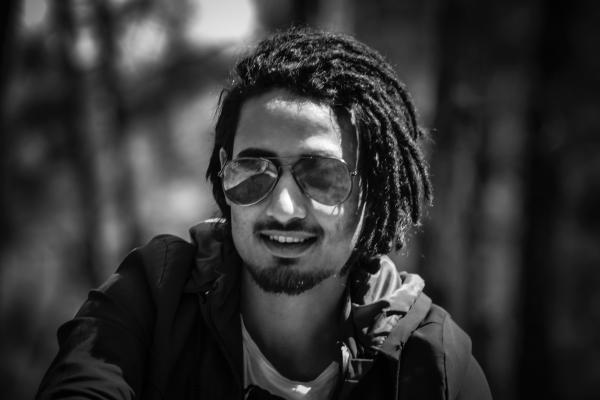Grayscale Photography of Man Wearing Sunglasses