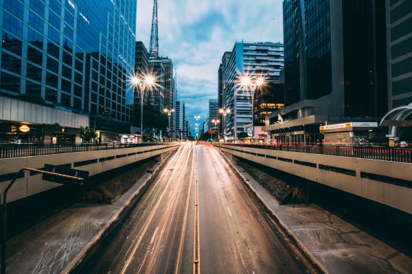 Grey Highway Between High Rise Building