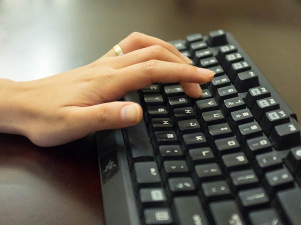 Hand on keyboard