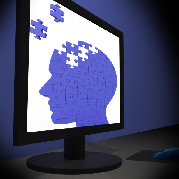 Head Puzzle On Monitor Showing Human Brightness