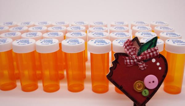 Heart and bottles of pills