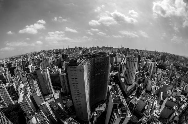 High Angle View of Cityscape Against Cloudy Sky
