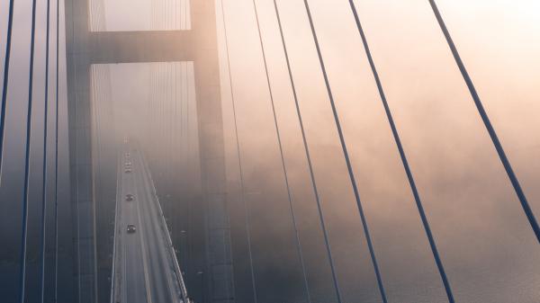 High Angle View of Suspension Bridge Against Sky