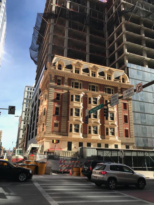 Historic building surrounded by new construction, Baltimore Street and Light Street (southeast corner), Baltimore, MD 21201