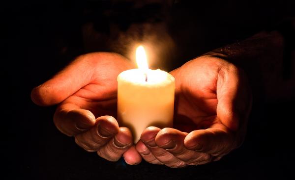Holding the Candle