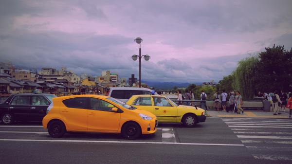 Hybrid Vehicle at Crosswalk