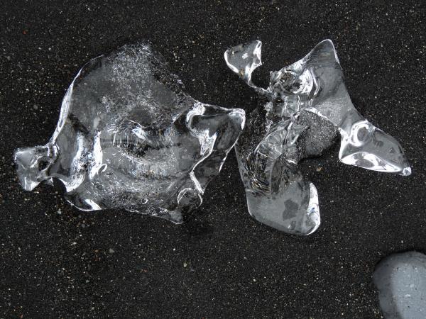 Ice on black sand