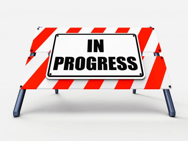 In Progress Sign Indicates Ongoing or Happening Now
