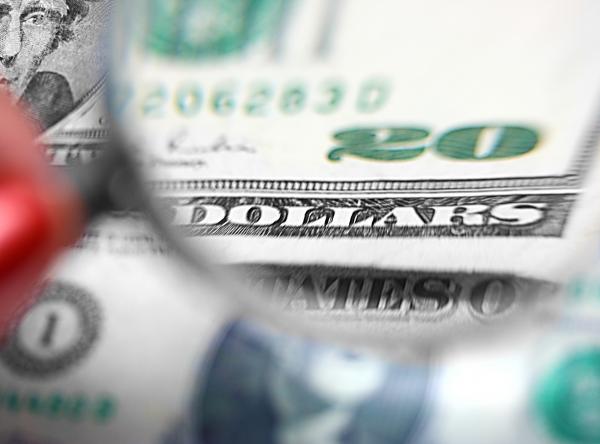 Inspecting A Twenty Dollar Bill