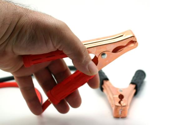 Jumper cables and hand