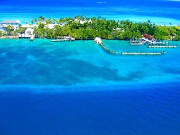 Landscape Photography of Island Surrounded Body of Water