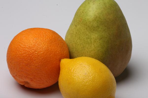 Lemon, Pear and Orange isolated on white